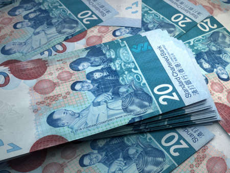 Money of Hong Kong. Hong Kong dollar bills. HKDSCB banknotes. 20 dollars. Business, finance, news background.の写真素材
