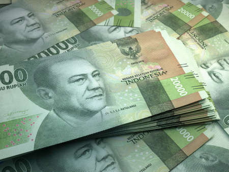 Money of Indonesia. Indonesian rupiah bills. IDR banknotes. 20,000 rupiahs. Business, finance, news background.の写真素材