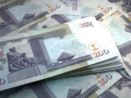 Money of Kenya. Kenyan shilling bills. KES banknotes. 100 shillings. Business, finance, news background.の写真素材