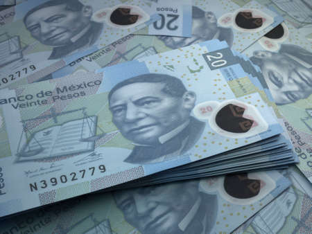 Money of Mexico. Mexican peso bills. MXN banknotes. 20 pesos. Business, finance, news background.の写真素材