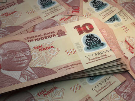 Money of Nigeria. Nigerian naira bills. NGN banknotes. 10 polymer. Business, finance, news background.の写真素材