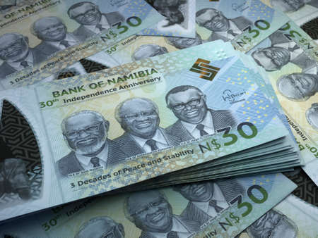 Money of Namibia. Namibian dollar bills. NAD banknotes. 30 dollars. Business, finance, news background.の写真素材