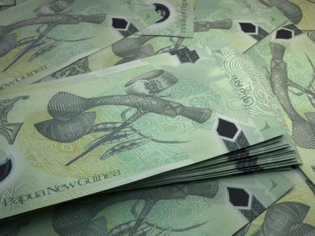 Money of Papua New Guinea. Papua New Guinean kina bills. PGK banknotes. 2 kina. Business, finance, news background.の写真素材