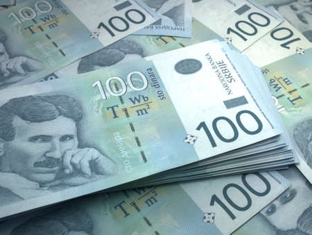Money of Serbia. Serbian dinar bills. RSD banknotes. 100 dinari. Business, finance, news background.の写真素材