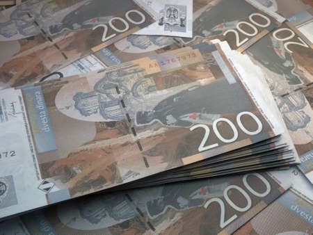Money of Serbia. Serbian dinar bills. RSD banknotes. 200 dinari. Business, finance, news background.の写真素材
