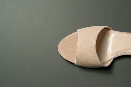 women's shoes of beige color on a black background. shoes removed from the topの写真素材