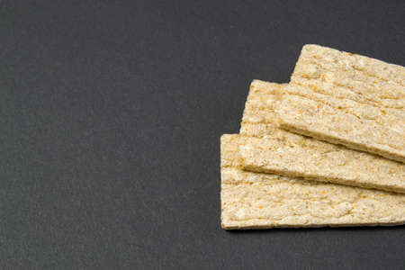 Healthy food. Airy diet loaves lie on a black background. diet food