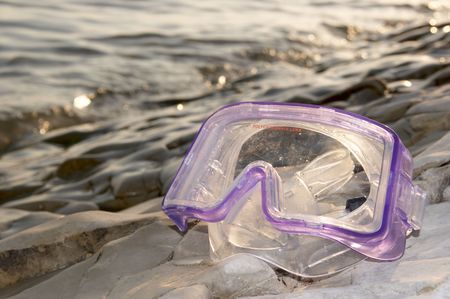 Mask for swimming ashore from stones.の写真素材