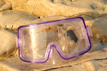 Mask for swimming ashore from stones.の写真素材