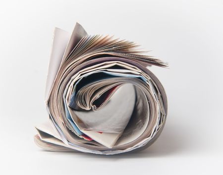 The newspaper curtailed into a tubeの写真素材