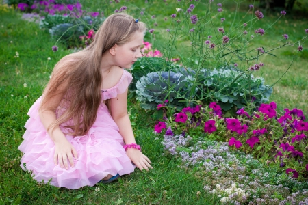 happy girl portrait standing outdoors smilingの写真素材