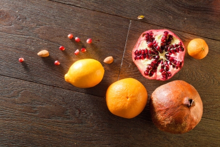 still life with pomegranate in red tonesの写真素材