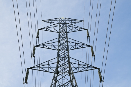 electric high voltage post with sky backgroundの写真素材
