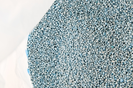 blue fertilizer in plastic bags agricultural useの写真素材