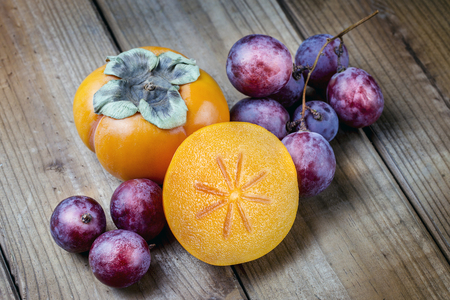 Kaki and grapesの写真素材