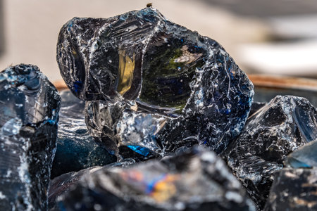 Pieces of broken glass with selective focus.の写真素材