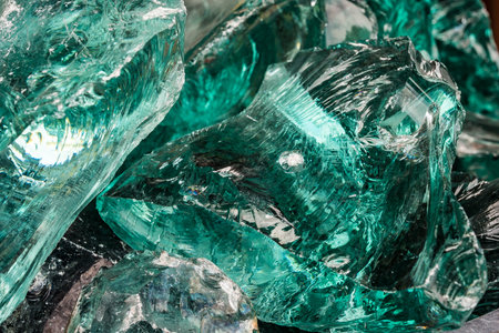 Close-up of a piece of crushed emerald gemstone.の写真素材