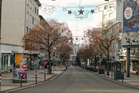 Pforzheim, Germany December pedestrian street lined with star decorations and bare trees, quiet retailのeditorial素材