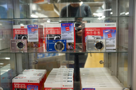 Pforzheim Germany March 9, 2026 Shelf Displaying Compact Cameras In Boxes Inside Glass Cabinet At...