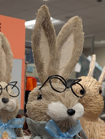 Plush Bunny With Glasses And Bow, Closeup Showing Woven Jute Texture, Button Nose, Soft Neutral...