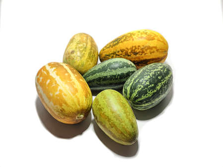 Group of Indian green and yellow cucumber isolated on white background.