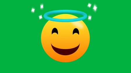 Halo emoji isolated on green background. honest and friendly emoji expression illustration.の写真素材