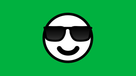 Sunglasses emoji icon isolated on green background. cool emoji expression.の写真素材