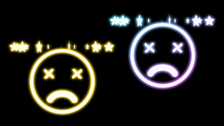 two star head and dizzy facial expression emoji in bright neon light on black background.の写真素材