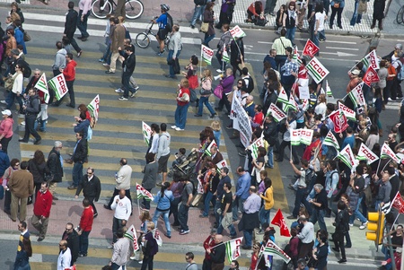 Crowd supporting 29-M strike in Malaga streetのeditorial素材