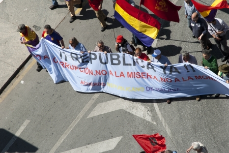 Several people participates in the demonstration in Malaga against Monarchy during the anniversary of the II Spanish Republicのeditorial素材