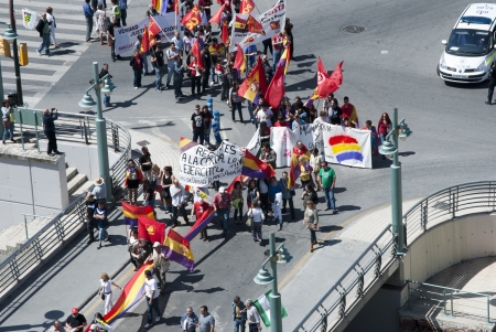 Several people participates in the demonstration in Malaga against Monarchy during the anniversary of the II Spanish Republicのeditorial素材