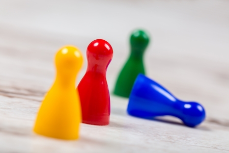 Four different game pawnsの写真素材