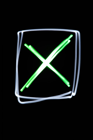 Flourescent checkbox with a green cross in itの写真素材