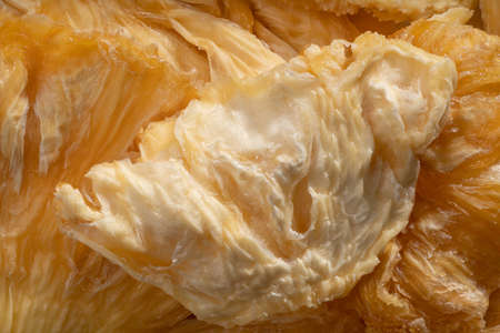 Detailed and large close up shot of dried pineapple.