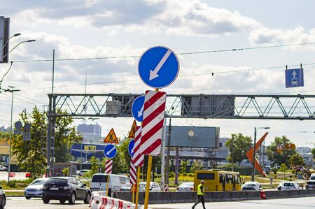Kiev Ukraine 08/15/2016. Road repair. Road signs. Road machinery.
