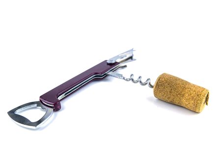 Cork from a wine bottle and a corkscrew on a white background. Place for text.の写真素材
