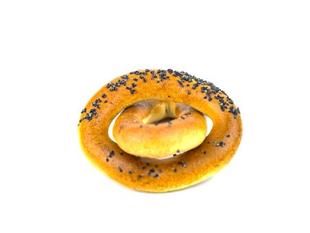 Bagels with poppy seeds on a white background. Drying. Food photo.の写真素材