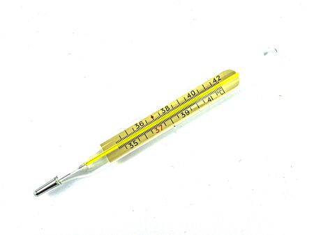 Mercury medical thermometer on a white background. Place for text. Medicine and health.