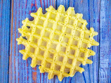 Wafer cookies on a wooden table with place for text. Bakery products. Food photo. Background image.