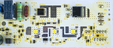 Electronic components on a circuit board with place for text. Technology. Industry.