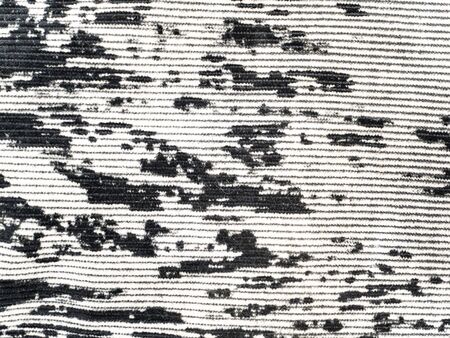 The texture of black and white velvet fabric. Background image. Place for text.