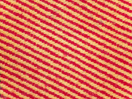 Texture of colored striped woolen fabric. Place for text. Background image.の写真素材