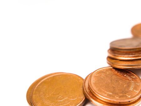 Money small coins on a white background with place for text. Euro. Cent. Business. Free place....