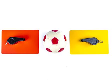 Soccer ball red and yellow cards with the whistle of a soccer referee on a white background. Football. Championship. World. Europe. Referee. Place for text.の写真素材