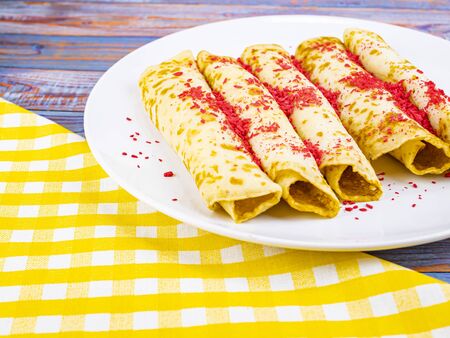 Pancakes on a plate on a pancake day. Fat Tuesday. Mardi Gras. Fastnacht. Vastlavya. Maslenitsa. Leftovers. Food photo.の写真素材