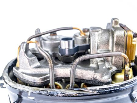 Compressor for repairing refrigerators on a white background. Repair of refrigerators. Equipment....