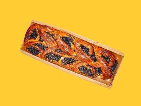 Culinary baking flour pie with poppy seed filling. Poppy filling for dessert. White bread. Flour dough product. Culinary pastries. Home kitchen. Sweet food menu. Food photo. Sweet food.の写真素材