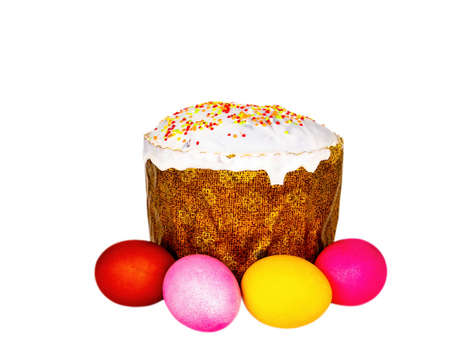 Easter bread and colored eggs on a white background. Easter eggs. Orthodox Church. Religious...