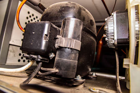 Repair of the engine of an industrial refrigerator unit.の写真素材