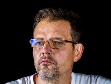 Portrait of a bearded man with glasses for vision. A man with a gray beard. Portrait. Glasses for...